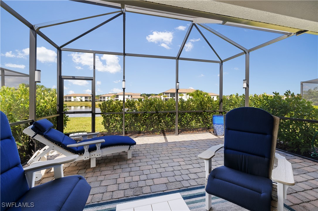 12000 Arbor Trace Drive Fort Myers, FL 33913 - Photo 38 of 50 a building outdoor space with patio couch and glass door