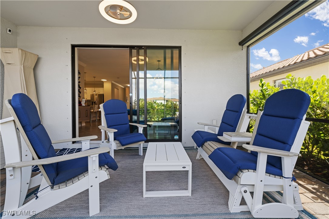 12000 Arbor Trace Drive Fort Myers, FL 33913 - Photo 40 of 50 a living room with furniture and a window
