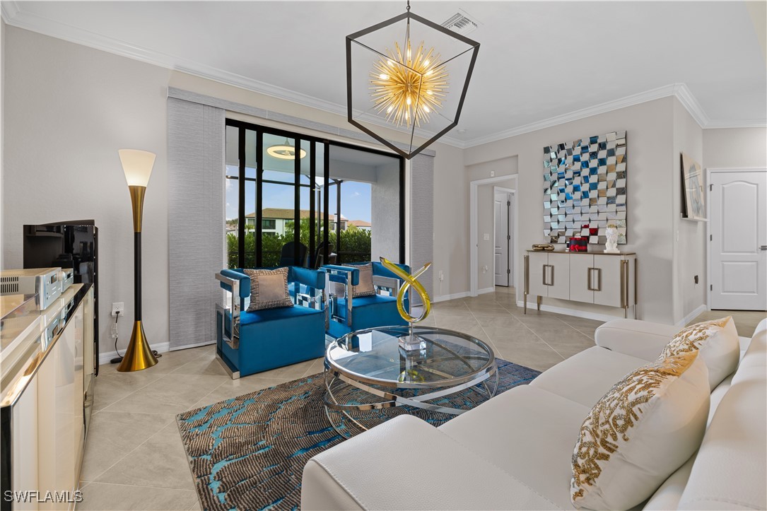 12000 Arbor Trace Drive Fort Myers, FL 33913 - Photo 4 of 50 a living room with furniture and a flat screen tv