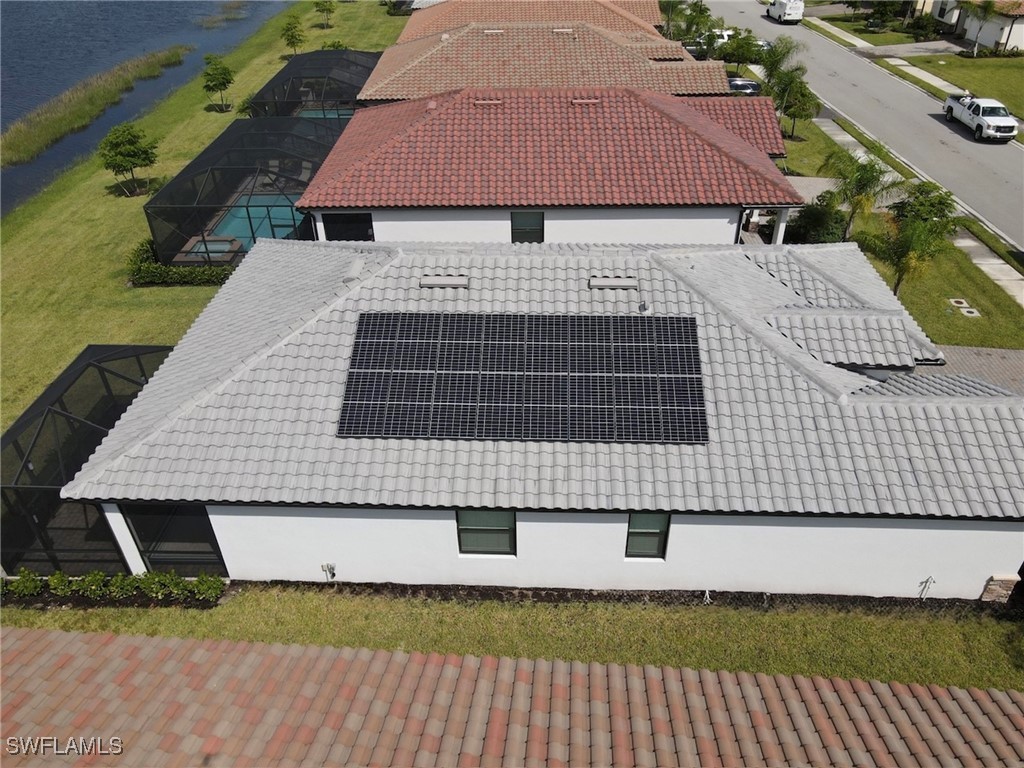 12000 Arbor Trace Drive Fort Myers, FL 33913 - Photo 45 of 50 a front view of a house with a garden