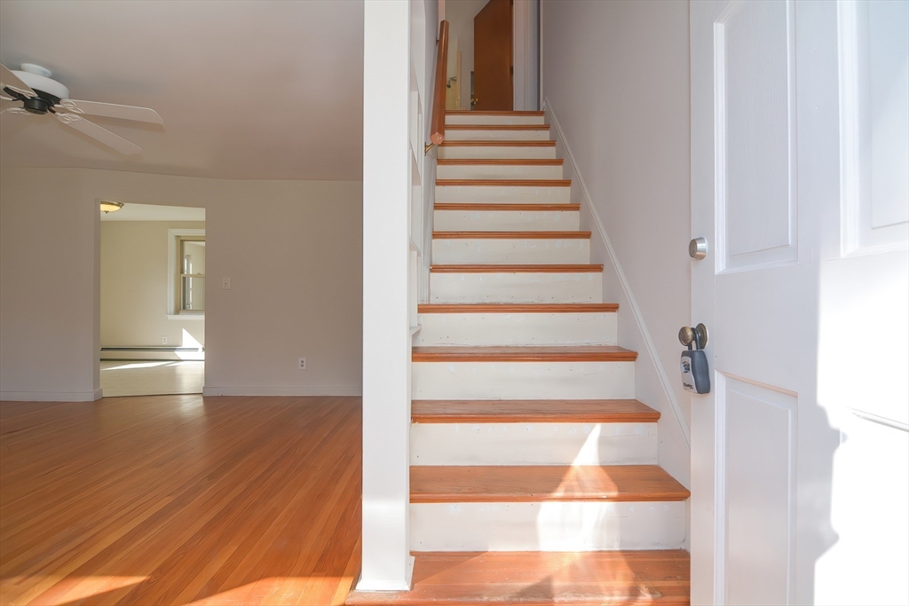 31 Jarr Brook Road Holliston, MA 01746 - Photo 24 of 37 a view of entryway and hall with wooden floor