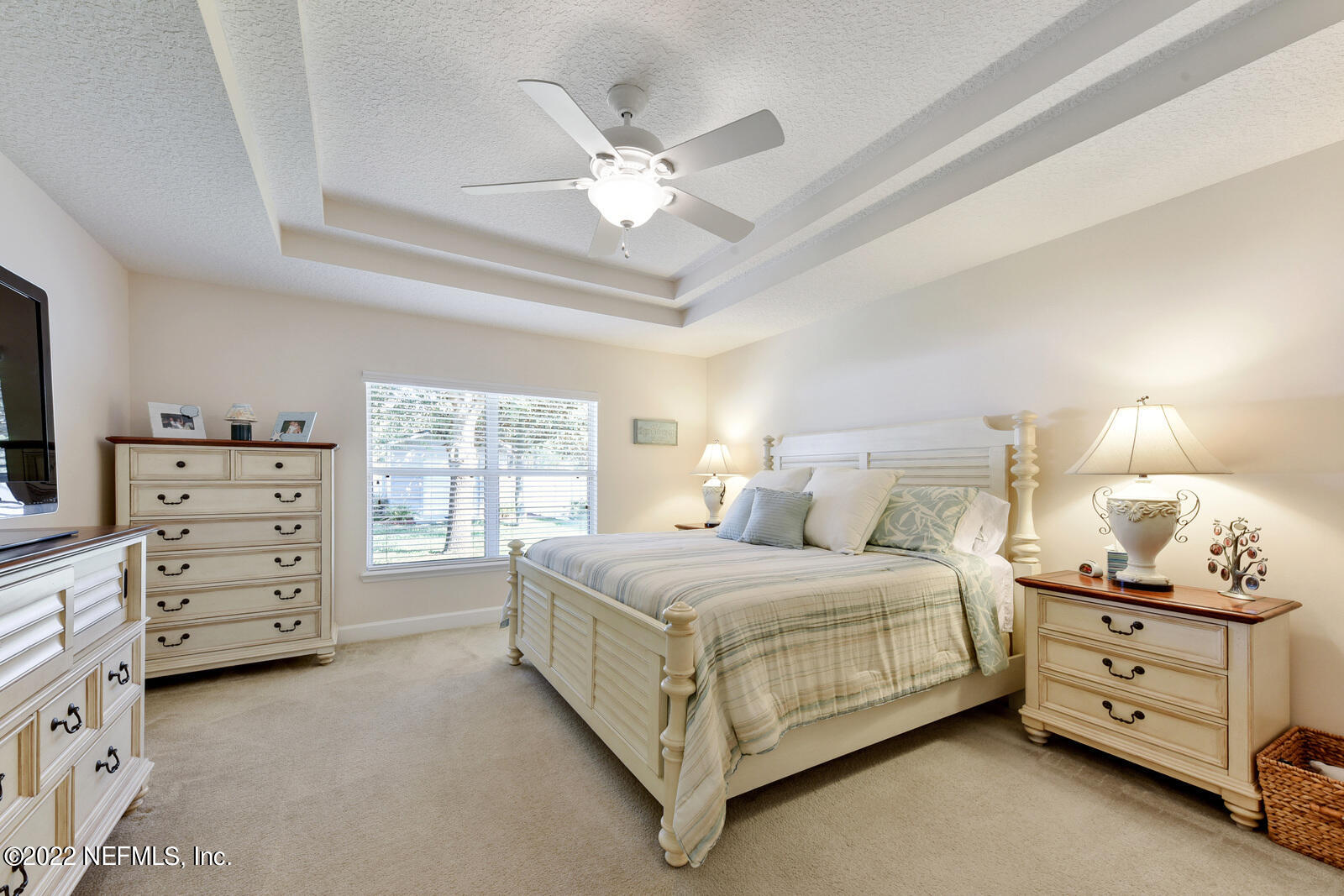 1973 Derringer Road Jacksonville, FL 32225 - Photo 14 of 25 a bedroom with a bed and a dresser