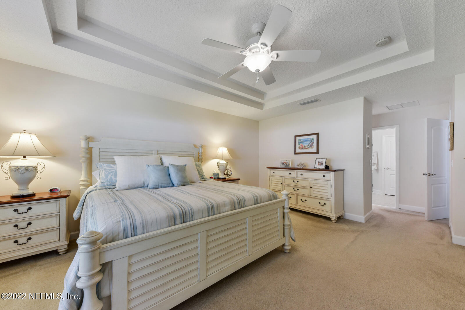 1973 Derringer Road Jacksonville, FL 32225 - Photo 15 of 25 a bed room with two bed and a lamp