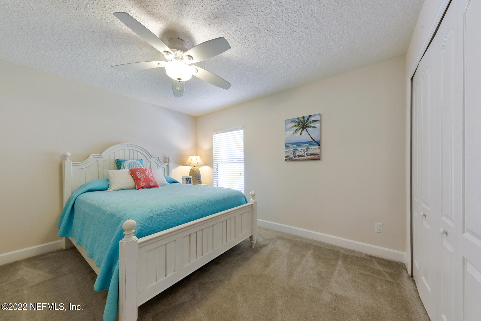 1973 Derringer Road Jacksonville, FL 32225 - Photo 20 of 25 a bedroom with a bed and window