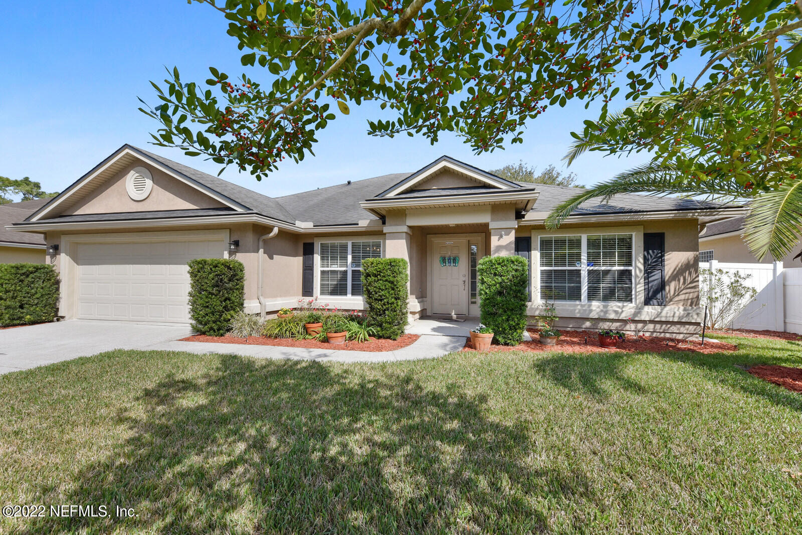 1973 Derringer Road Jacksonville, FL 32225 - Photo 2 of 25 a front view of a house with a yard