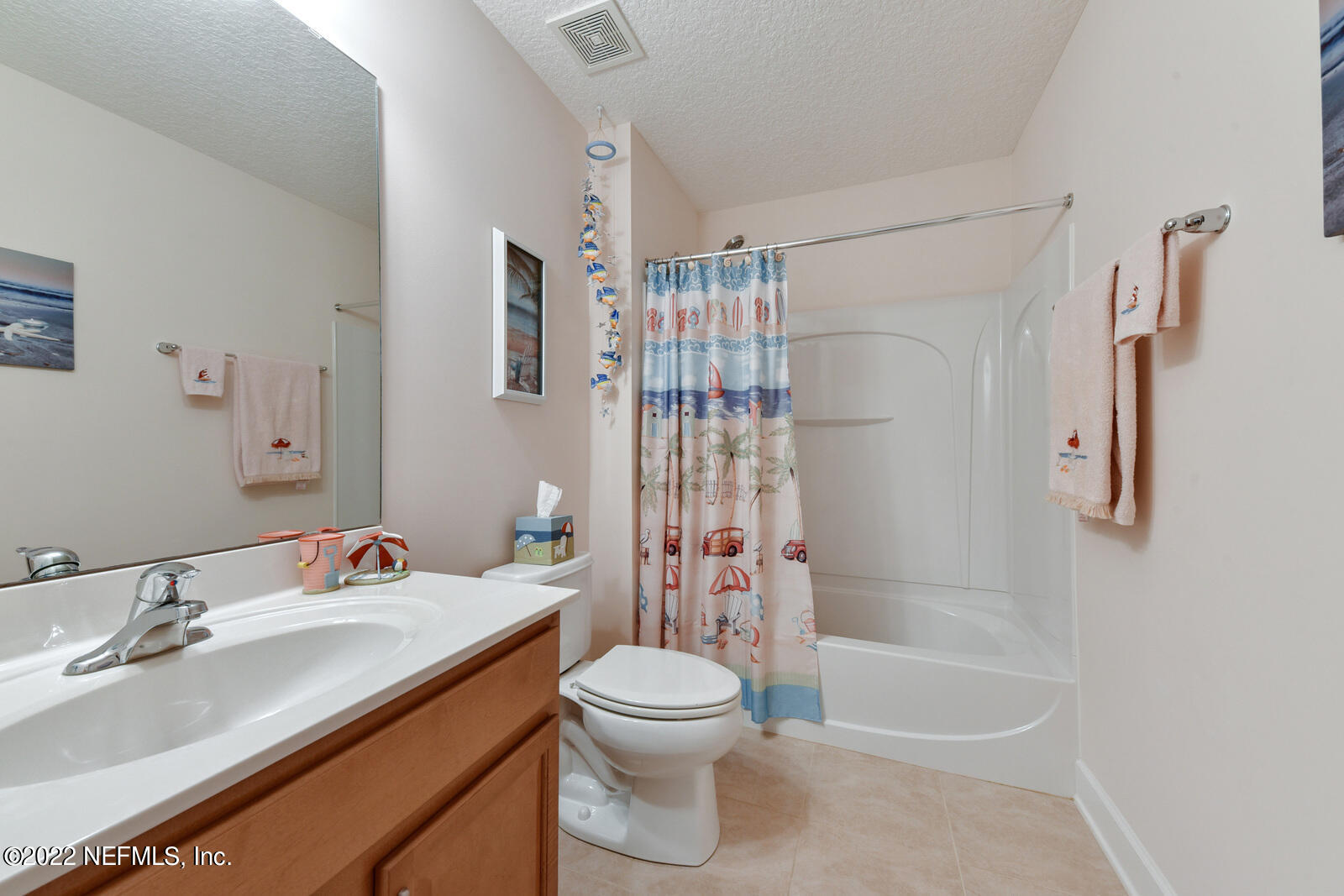 1973 Derringer Road Jacksonville, FL 32225 - Photo 21 of 25 a bathroom with a sink a toilet and shower