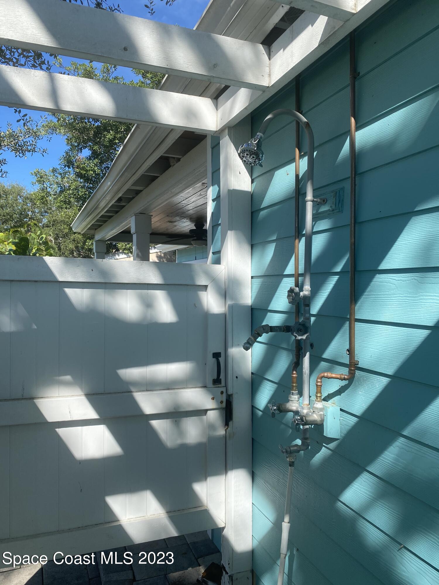 433 Blakey Boulevard Cocoa Beach, FL 32931 - Photo 14 of 15 a close view of water heater room