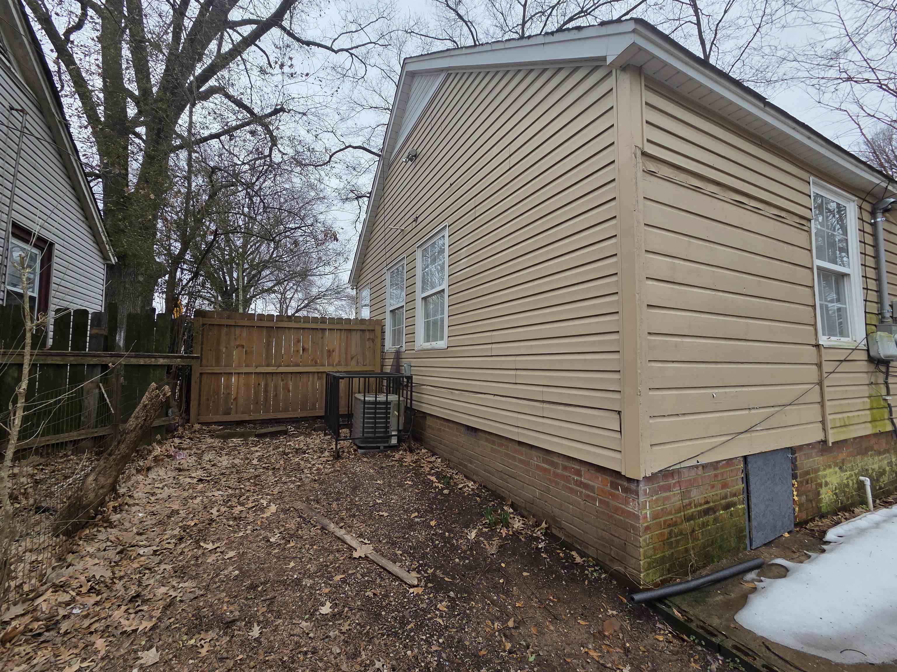 3458 Radford Road Memphis, TN 38111 - Photo 2 of 18 View of property exterior with crawl space and a gate