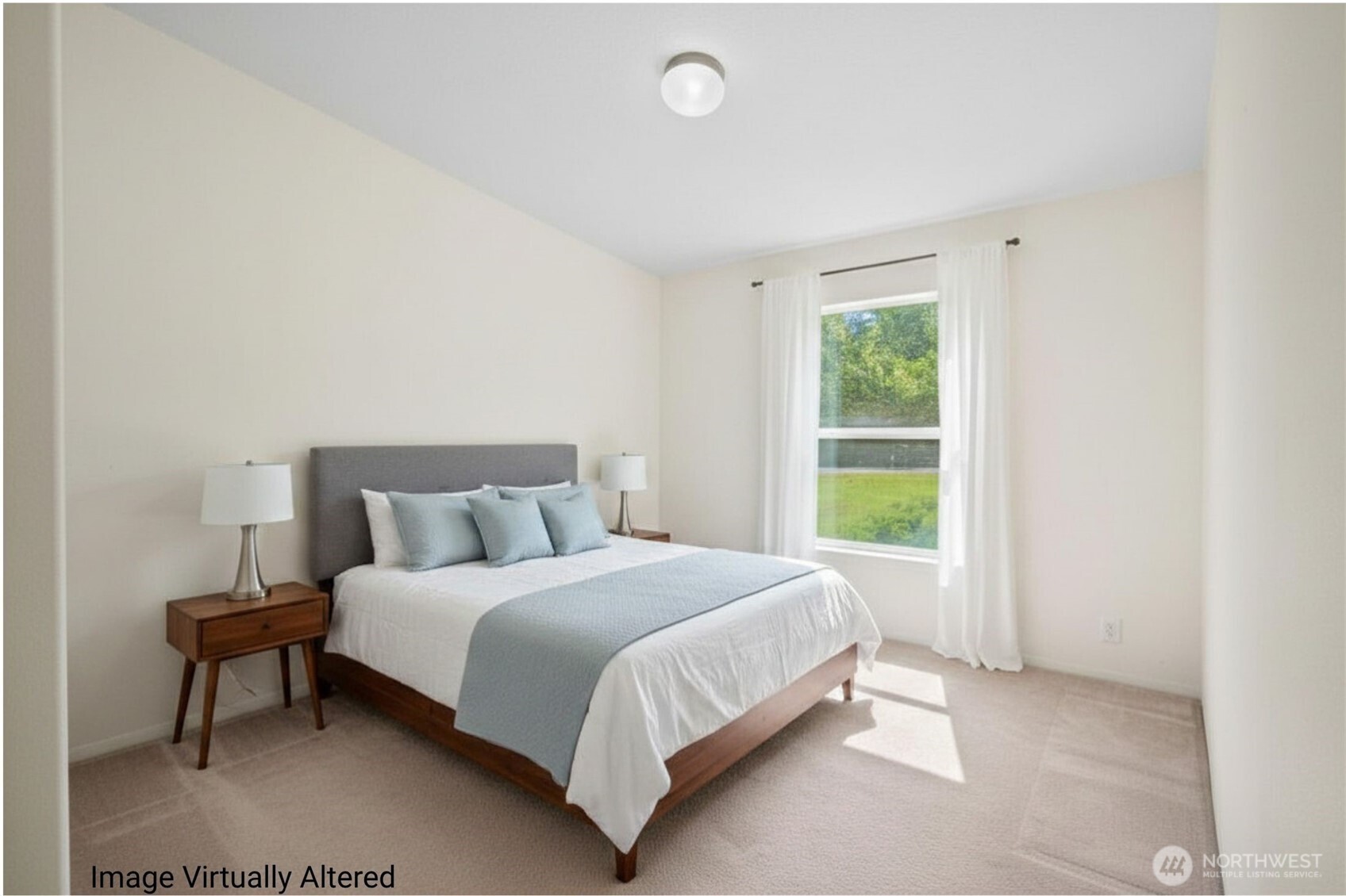 4230 Cody Road Blaine, WA 98230 - Photo 21 of 38 a bedroom with a bed and a window