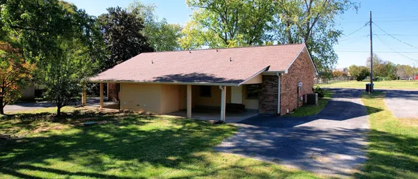 a view of a back yard of the house