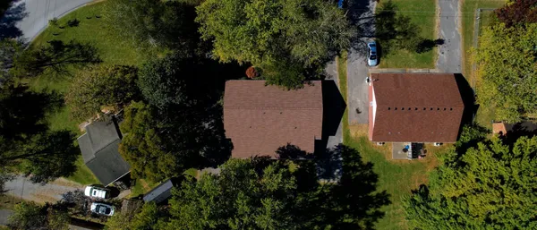 an aerial view of a house with a garden