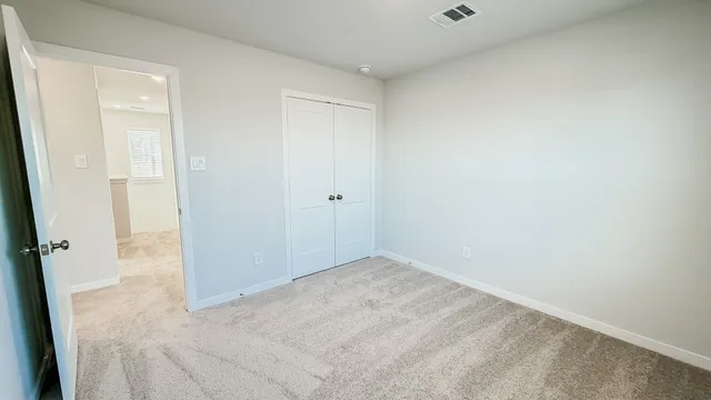 a bathroom with a granite countertop sink a toilet and bathtub