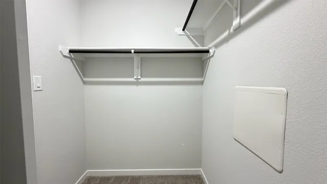 a view of a front of house with a yard and garage