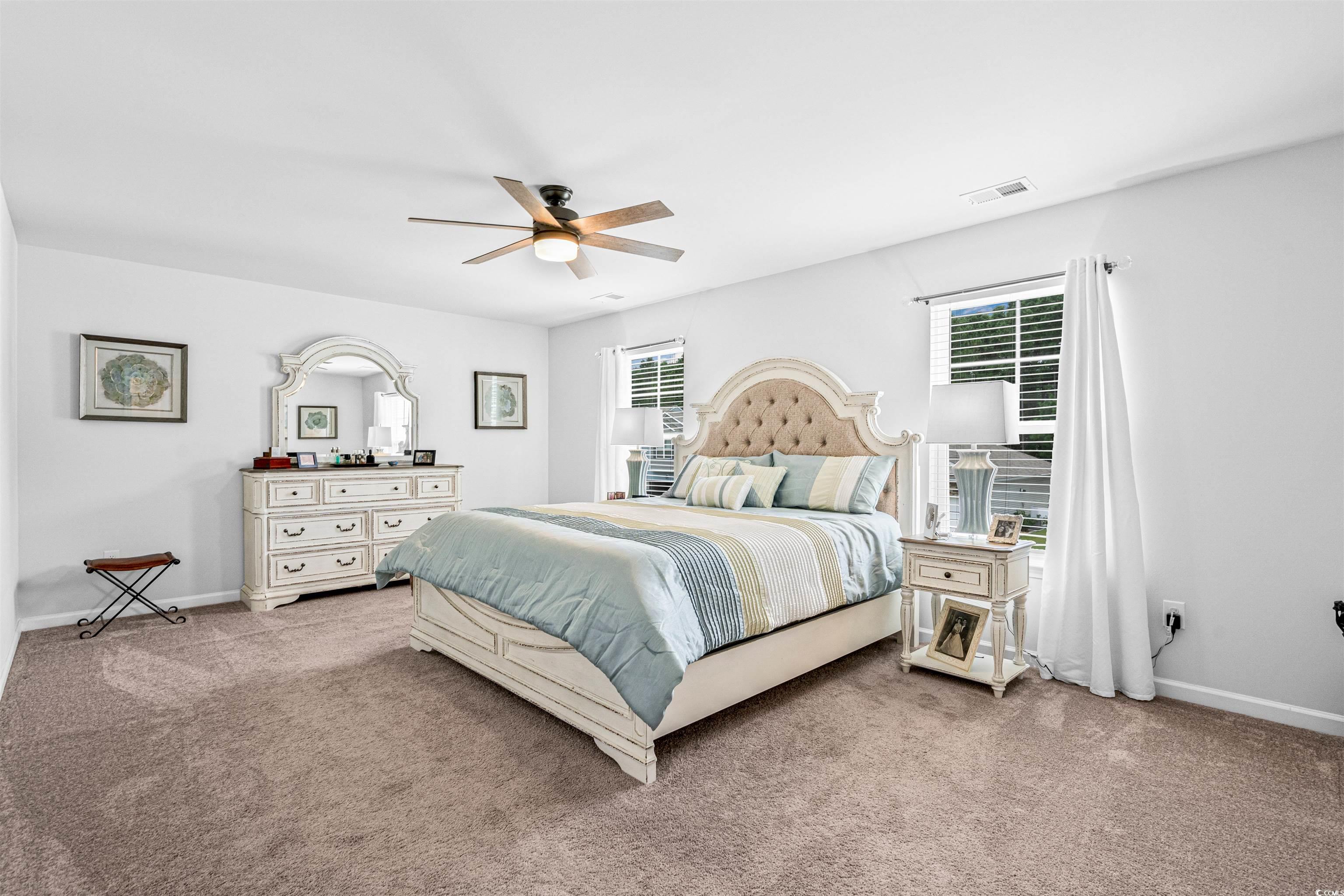 331 Emery Oak Drive Murrells Inlet, SC 29576 - Photo 18 of 32 Extra large owner's suite with ceiling fan.