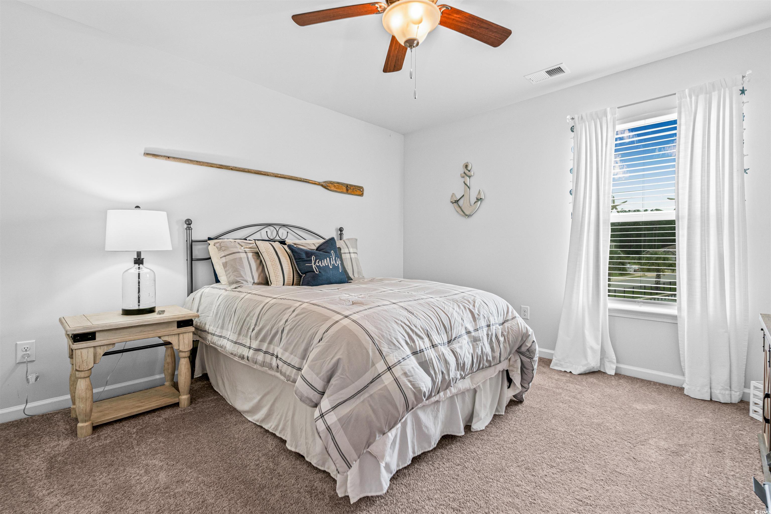 331 Emery Oak Drive Murrells Inlet, SC 29576 - Photo 23 of 32 Carpeted bedroom featuring baseboards and ceiling fan