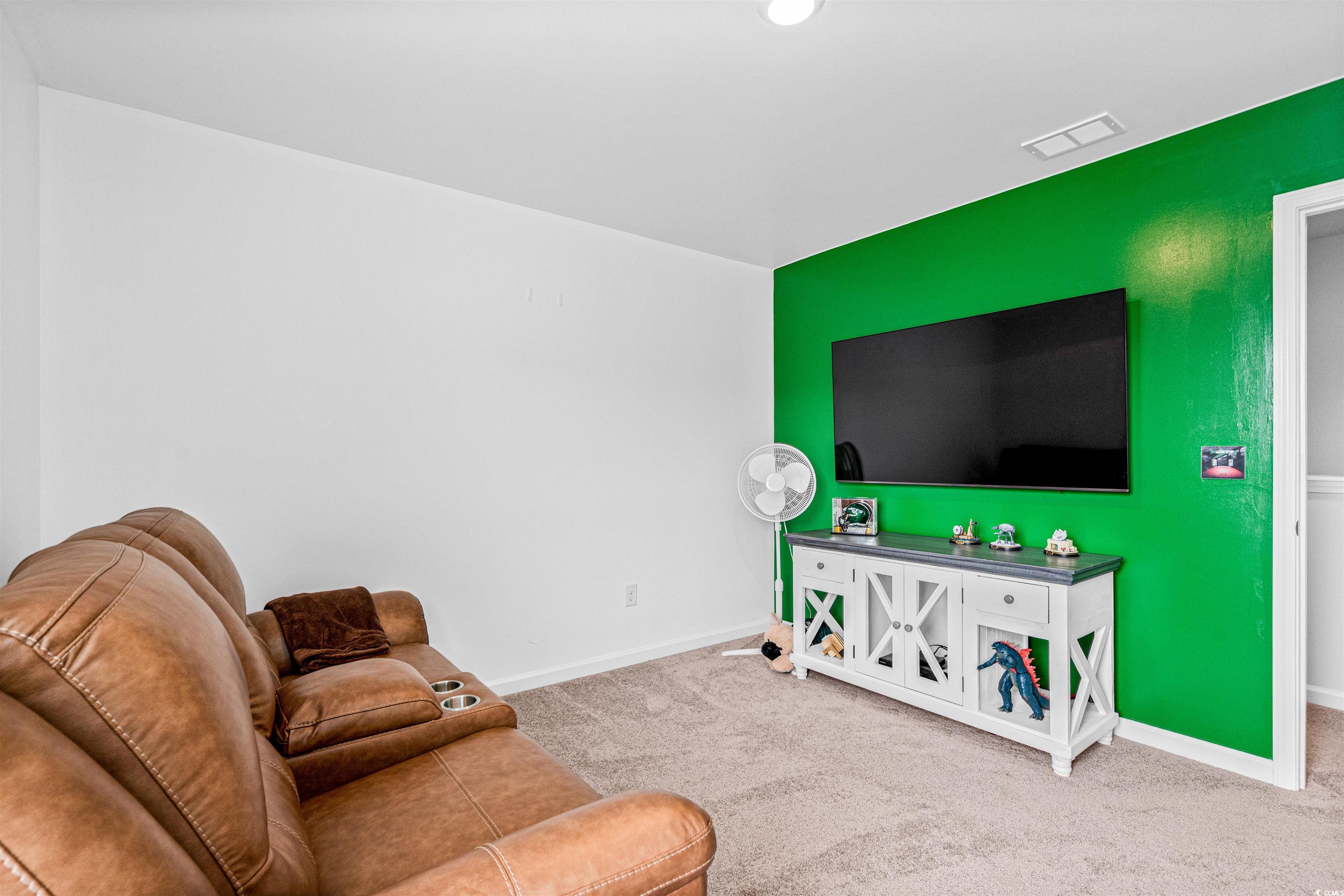 331 Emery Oak Drive Murrells Inlet, SC 29576 - Photo 26 of 32 Spacious room currently used as a sports viewing room.