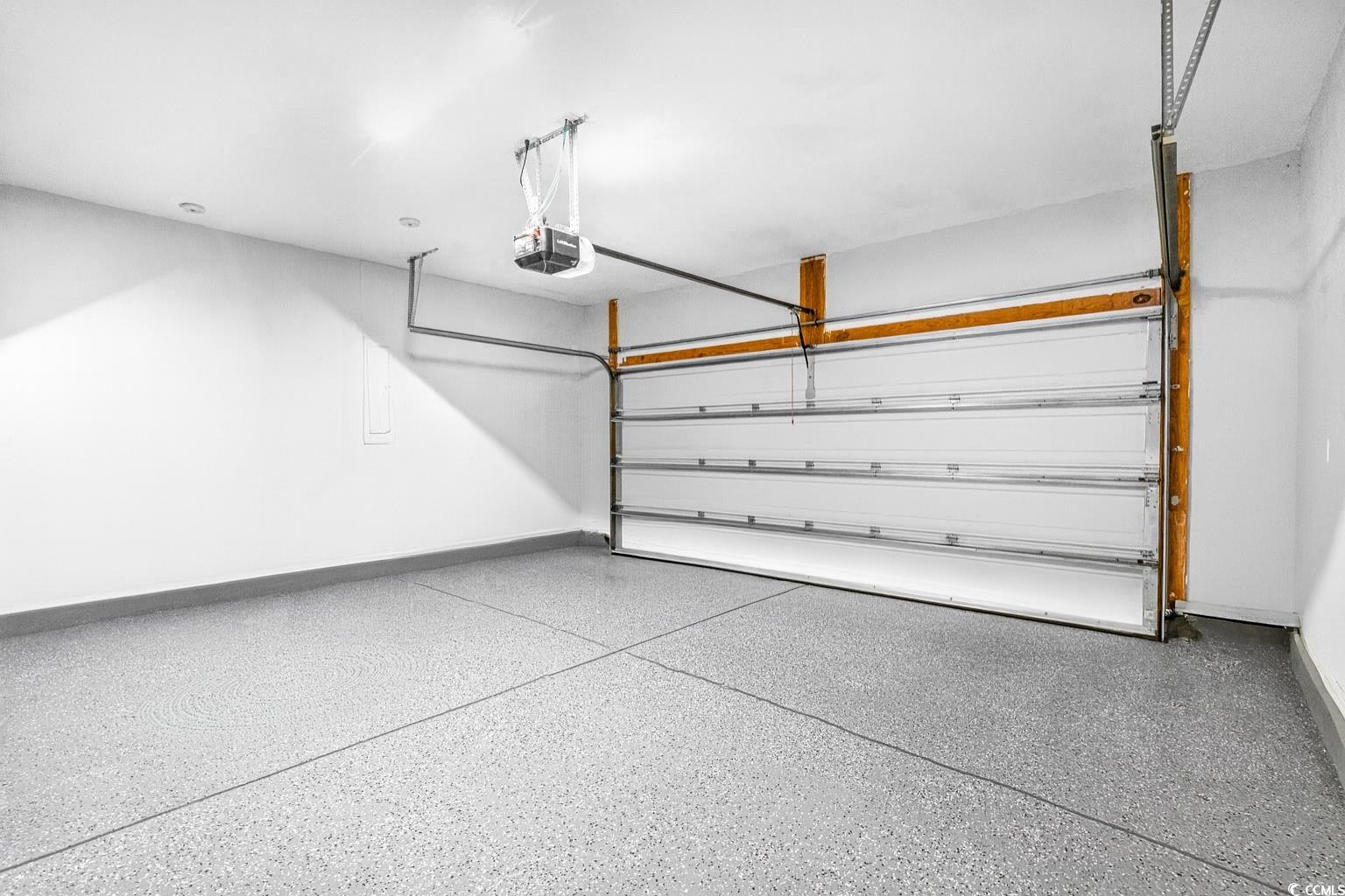 331 Emery Oak Drive Murrells Inlet, SC 29576 - Photo 29 of 32 Large garage with epoxy floor.