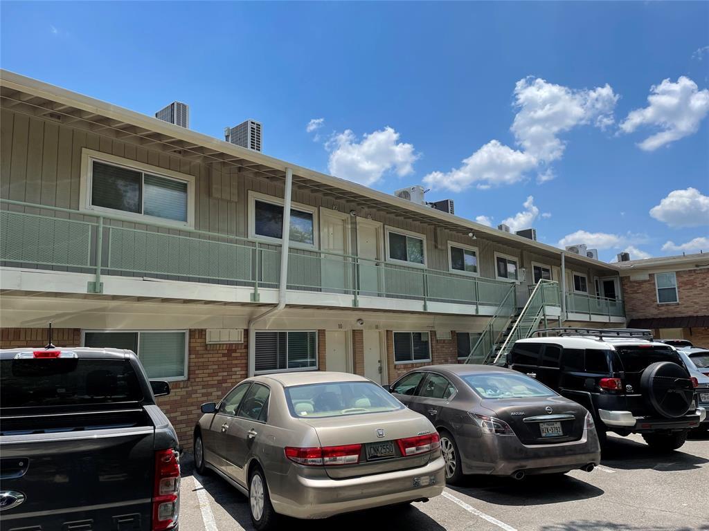 304 East 33rd Street, Unit 20 Austin, TX 78705 - Photo 9 of 12 a car parked in front of a building