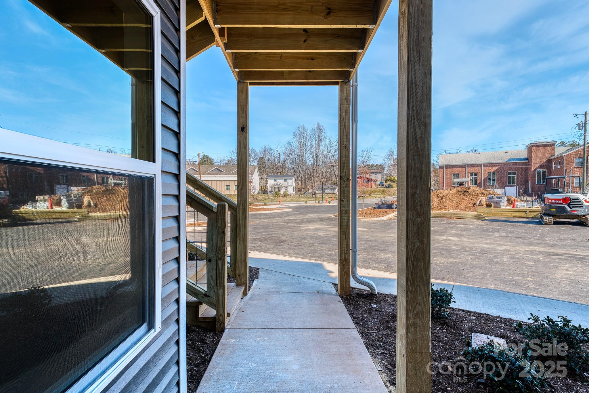 143 Carver Street, Unit 7 Brevard, NC 28712 - Photo 27 of 28 a view of a balcony door