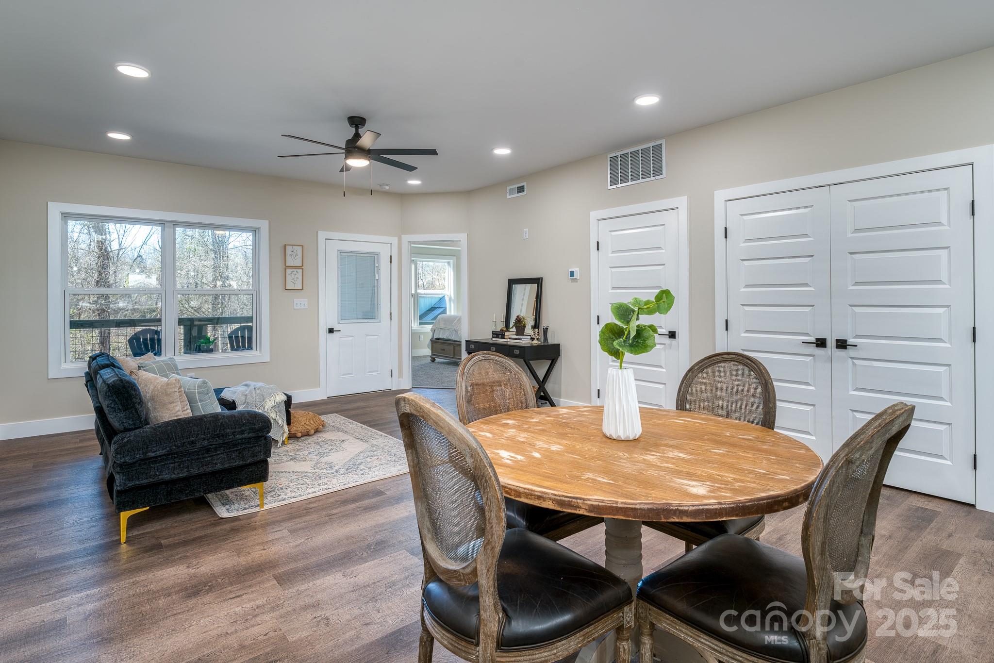 143 Carver Street, Unit 7 Brevard, NC 28712 - Photo 5 of 28 a view of a dining room with furniture