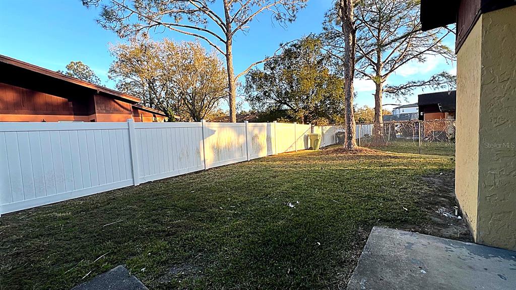 4166 Flying Fortress Avenue Kissimmee, FL 34741 - Photo 11 of 14 a view of back yard