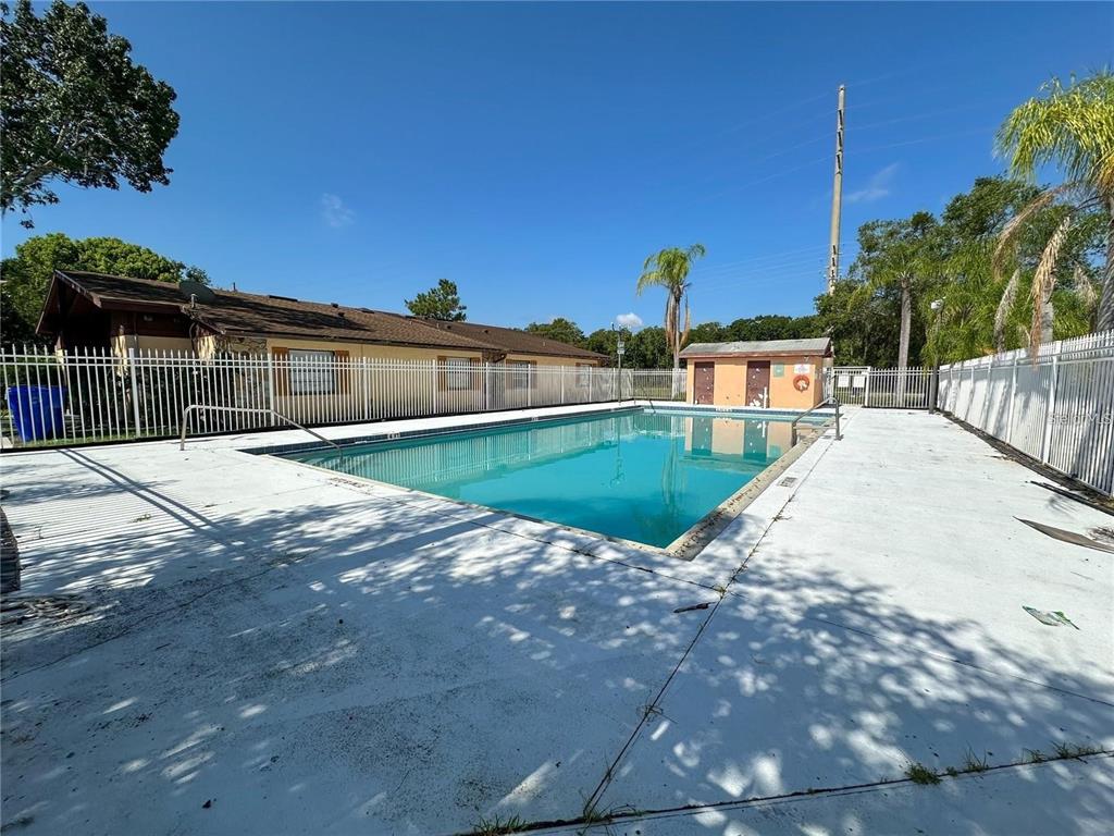 4166 Flying Fortress Avenue Kissimmee, FL 34741 - Photo 14 of 14 a view of a backyard with a patio