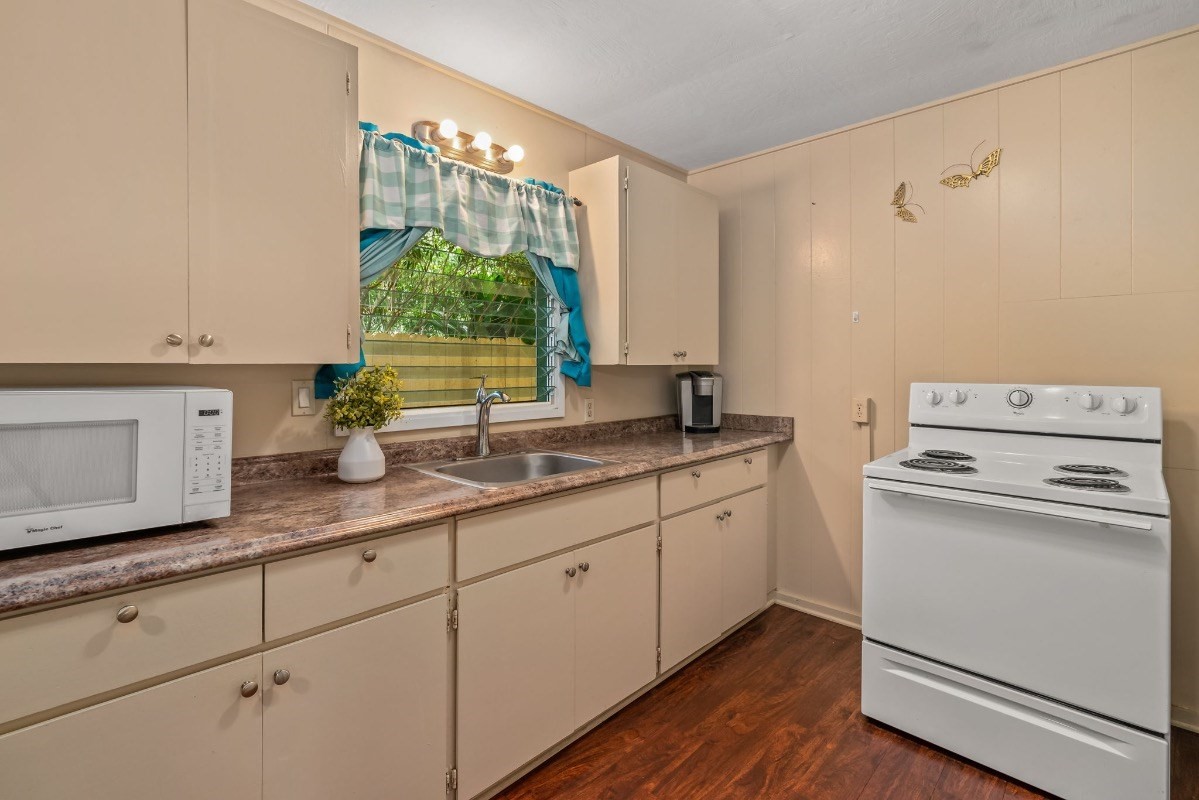 4430 Eke Road Koloa, HI 96756 - Photo 12 of 25 a kitchen with sink and cabinets