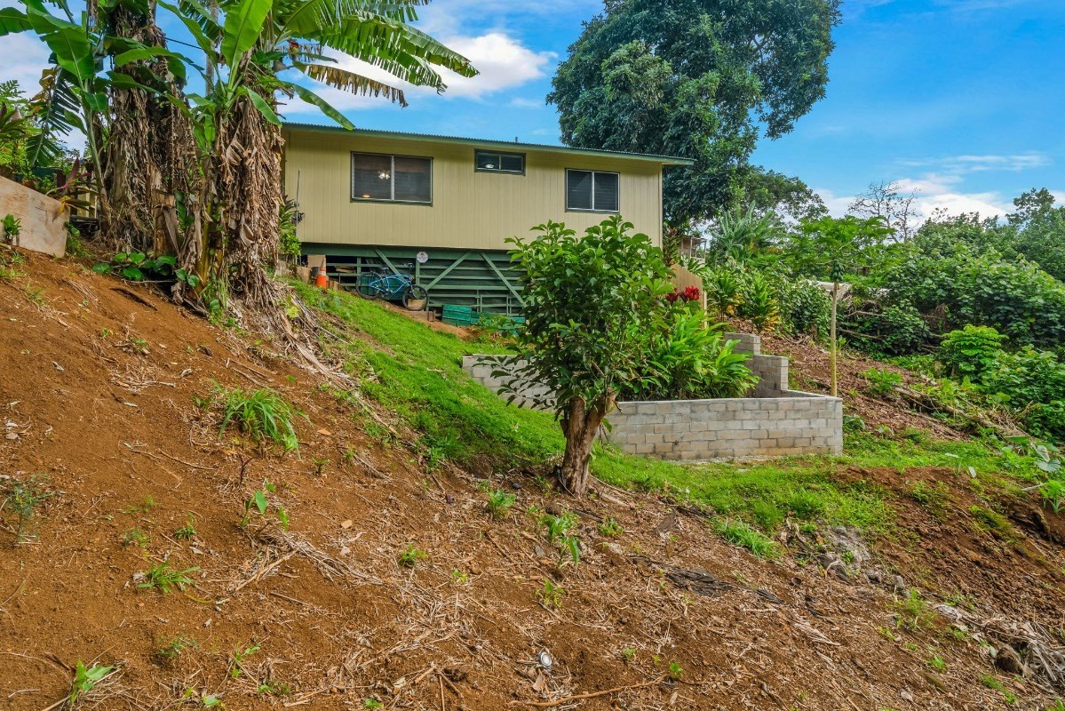 4430 Eke Road Koloa, HI 96756 - Photo 4 of 25 a front view of a house with a yard