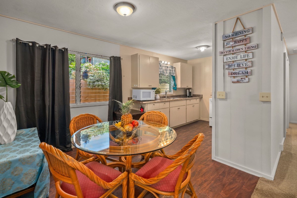 4430 Eke Road Koloa, HI 96756 - Photo 10 of 25 a dining room with furniture and window