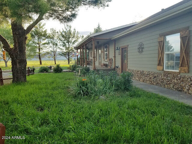 8255 North Fort Grant Road Willcox, AZ 85643 - Photo 2 of 40 a view of a house with a backyard
