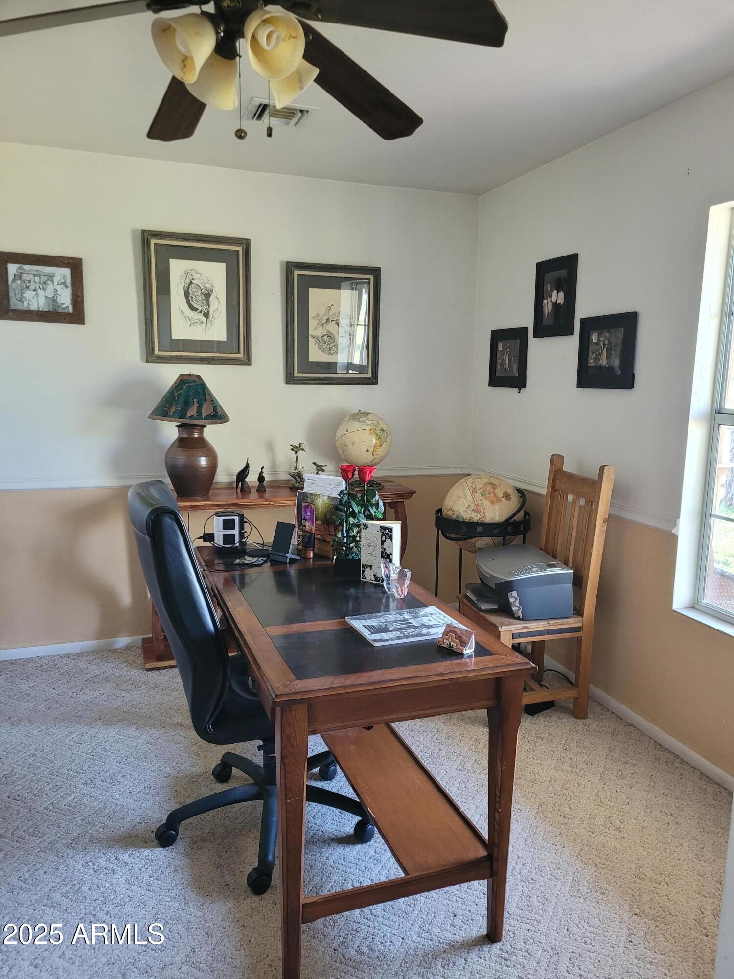 8255 North Fort Grant Road Willcox, AZ 85643 - Photo 31 of 40 a work room with furniture and window