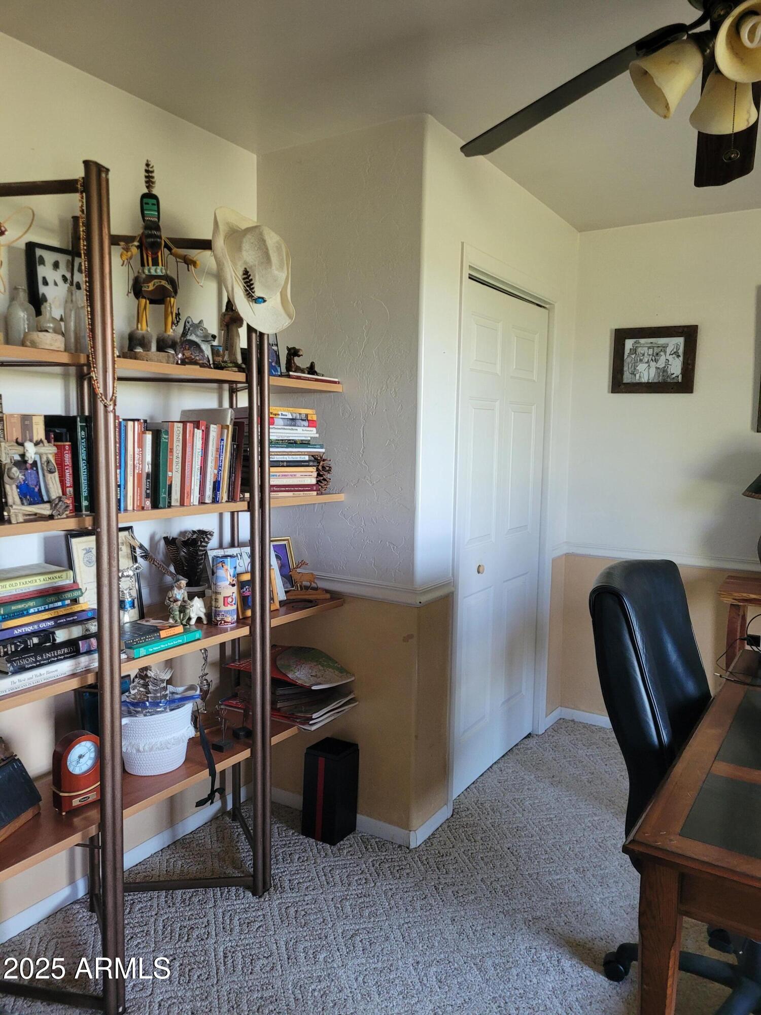 8255 North Fort Grant Road Willcox, AZ 85643 - Photo 32 of 40 a view of a workspace with furniture