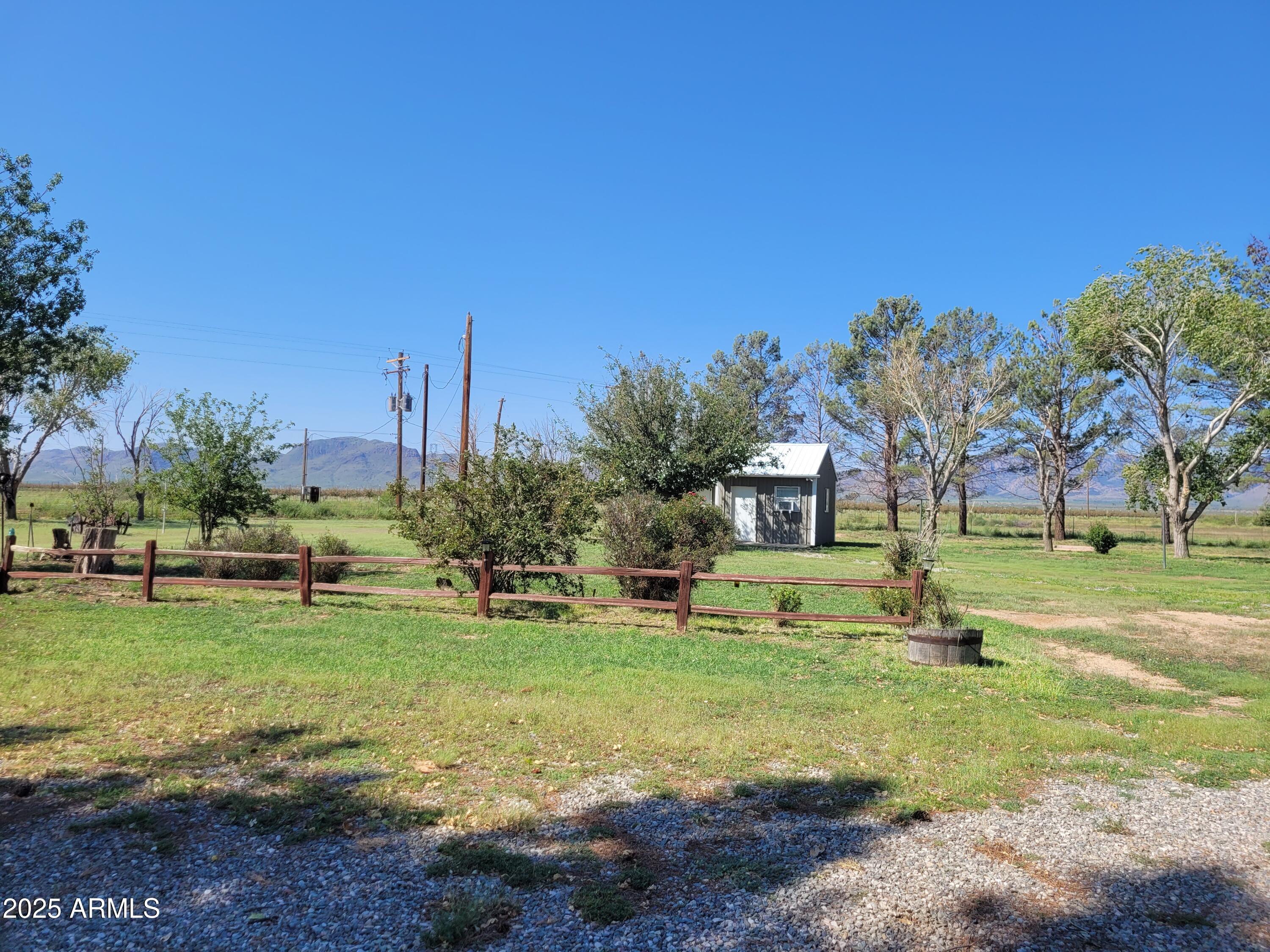 8255 North Fort Grant Road Willcox, AZ 85643 - Photo 9 of 40 a view of a park with large trees