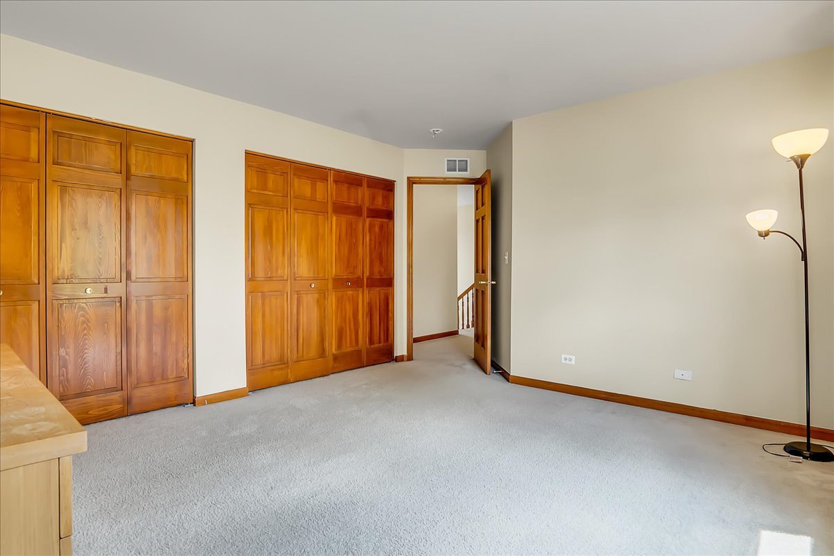 255 Hampton Road Sugar Grove, IL 60554 - Photo 18 of 28 a view of an empty room with a window