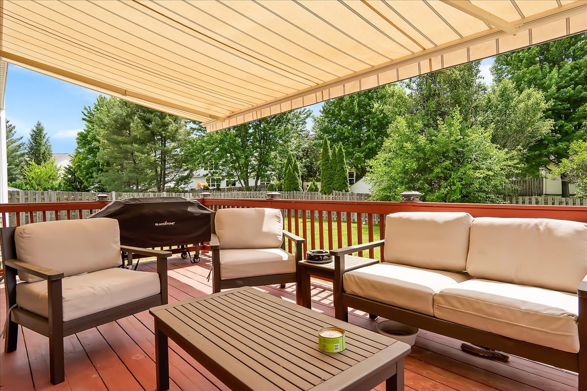 255 Hampton Road Sugar Grove, IL 60554 - Photo 25 of 28 a view of a patio with couches chairs and wooden floor