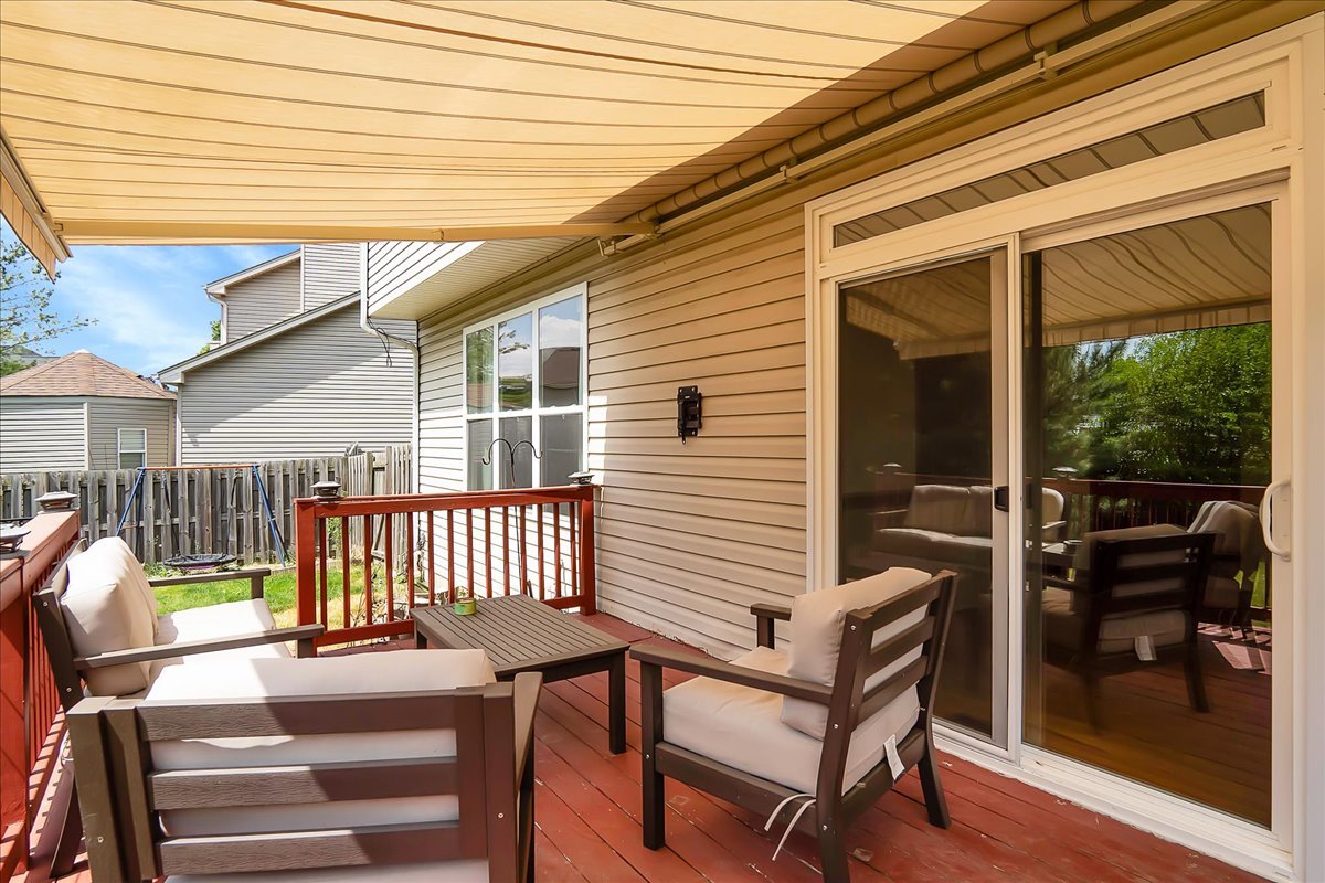 255 Hampton Road Sugar Grove, IL 60554 - Photo 26 of 28 a view of a patio with a table and chairs
