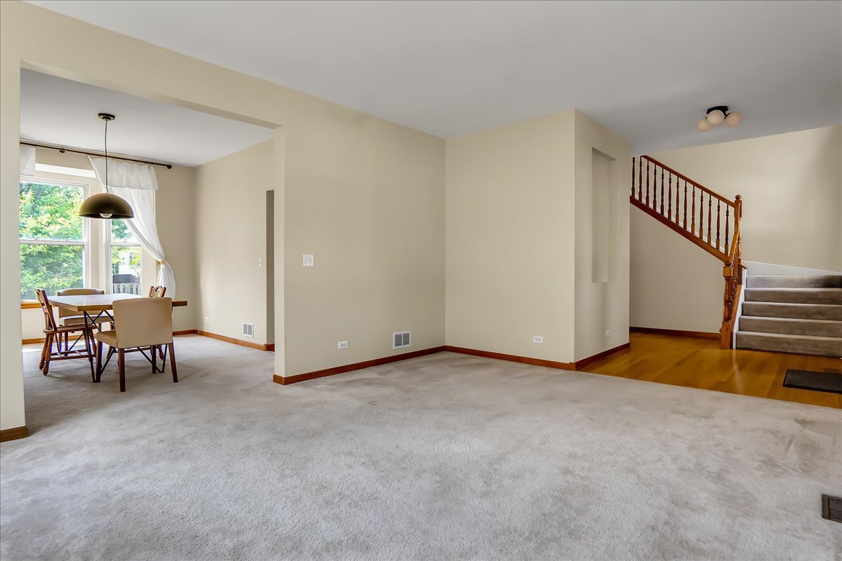 255 Hampton Road Sugar Grove, IL 60554 - Photo 4 of 28 a view of a livingroom with furniture and a window