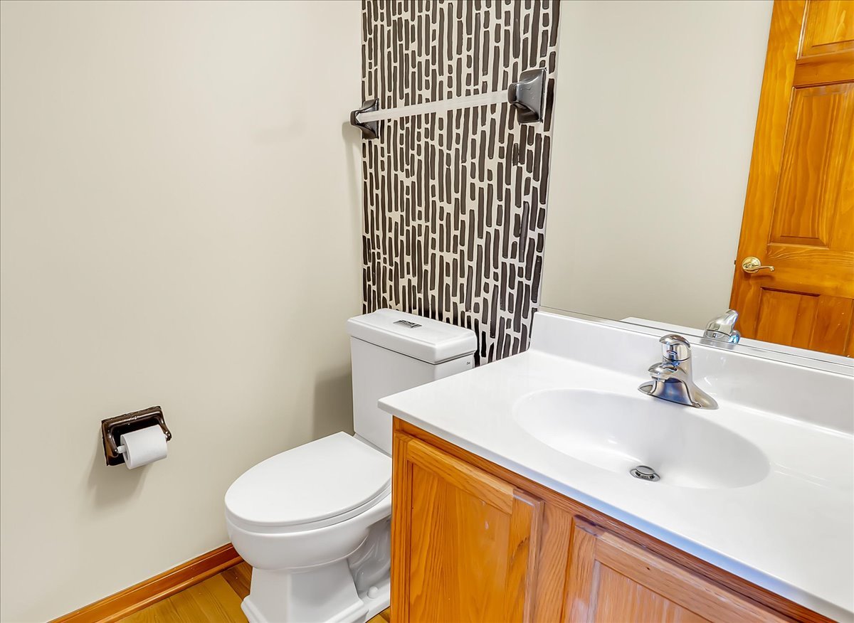 255 Hampton Road Sugar Grove, IL 60554 - Photo 9 of 28 a bathroom with a sink a toilet and a mirror