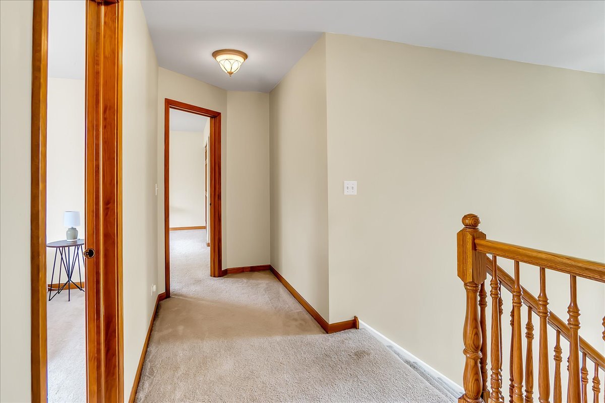 255 Hampton Road Sugar Grove, IL 60554 - Photo 10 of 28 a view of a hallway with wooden floor and entryway