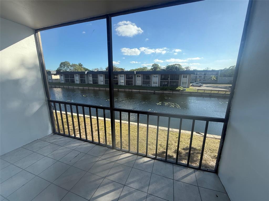 7960 North Colony Circle Tamarac, FL 33321 - Photo 8 of 11 a view of a balcony with city view