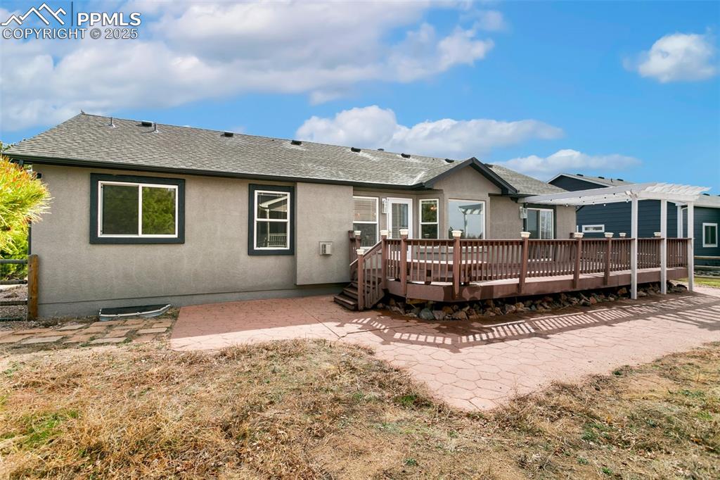 8946 Oakmont Road Peyton, CO 80831 - Photo 35 of 35 a view of a house with a yard and roof