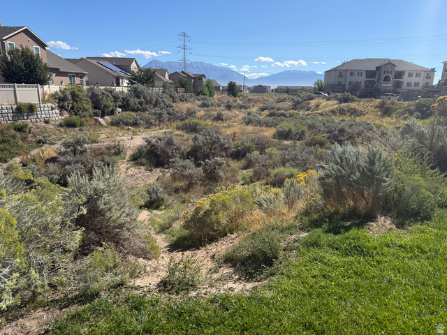 3618 Clear Rock Road, Unit 2 Eagle Mountain, UT 84005 - Photo 14 of 14 Expansive undeveloped land featuring natural vegetation and distant mountain ranges