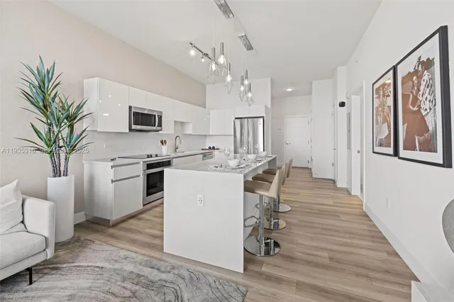 a bedroom with a bed and a television