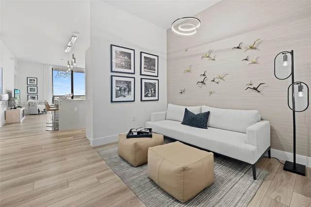 a bathroom with a sink vanity mirror and toilet