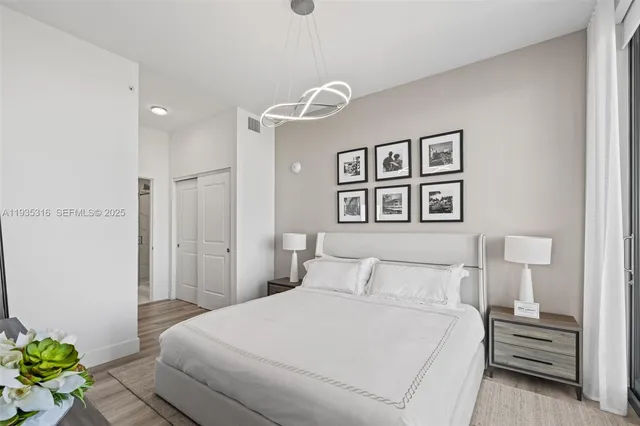 a spacious bathroom with a double vanity and a shower