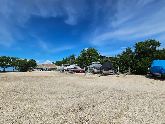 a view of a road with a building in the background