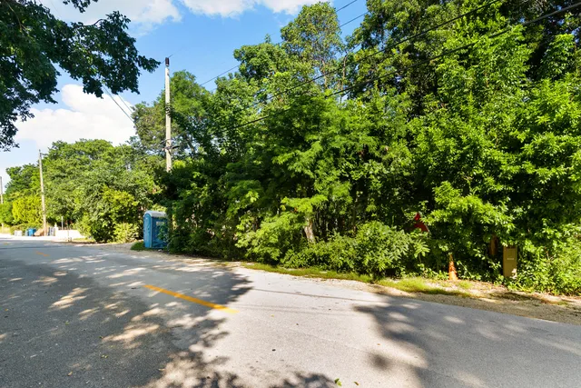 a picture of a bathroom with a shower