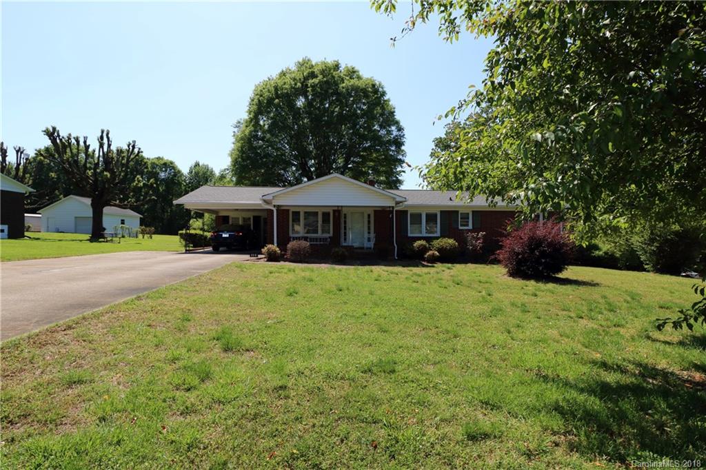 503 Roy Eaker Road Cherryville, NC 28021 - Photo 1 of 17 a front view of a house with garden