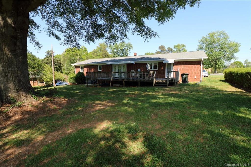 503 Roy Eaker Road Cherryville, NC 28021 - Photo 15 of 17 a view of a house with a yard and sitting area