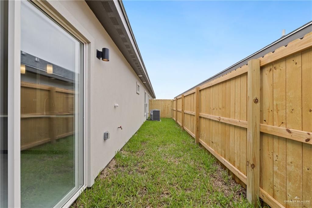 1806 West Violet Drive, Unit 1 Pharr, TX 78577 - Photo 15 of 15 a view of a back yard with wooden floor